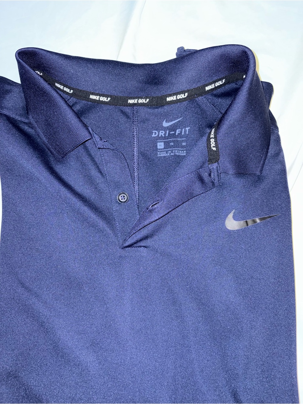 Nike Navy Dri-FIT Polo with black Swoosh